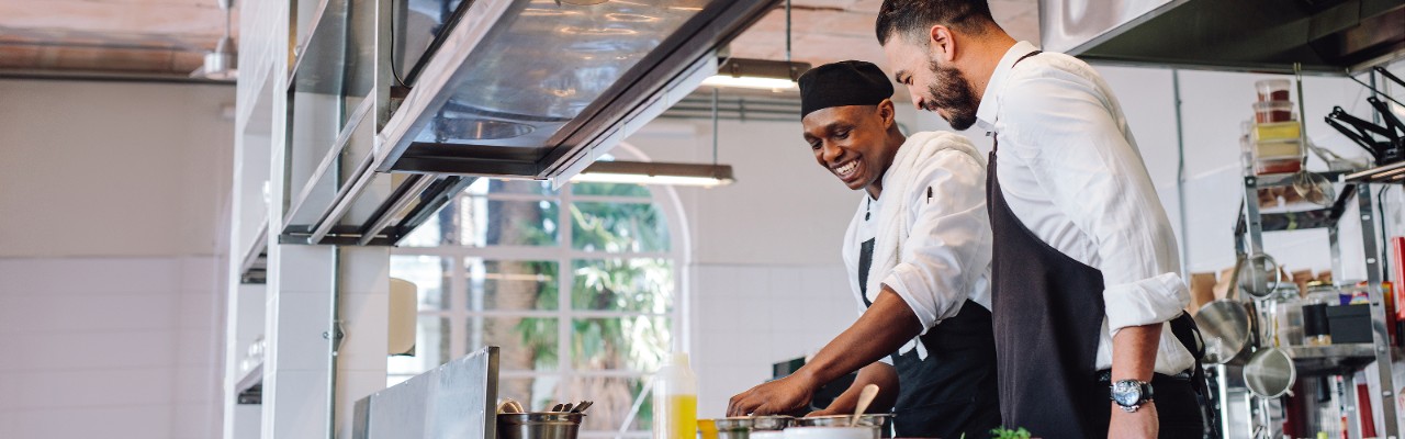 Workers in an commercial restaurant setting